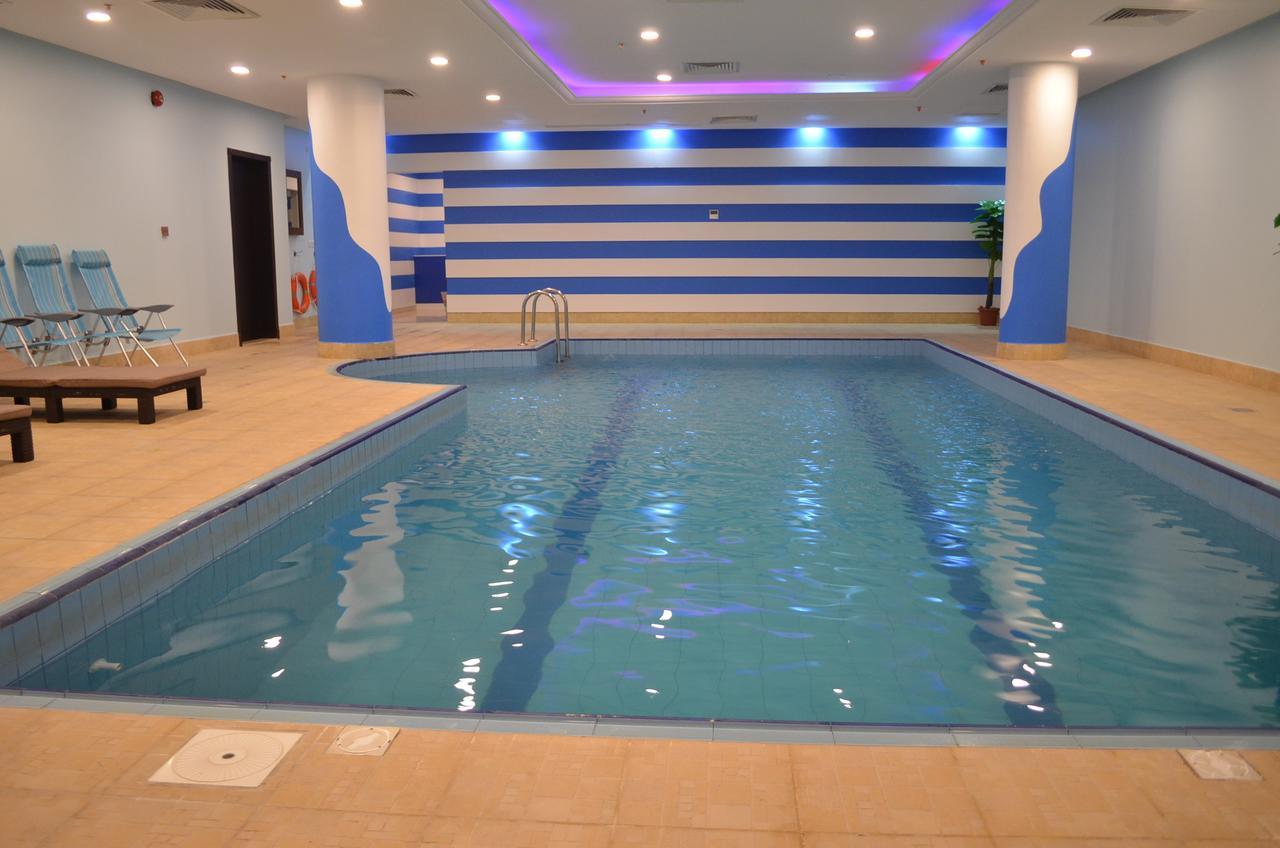 One To One Aparthotel Αλ Κομπάρ Εξωτερικό φωτογραφία